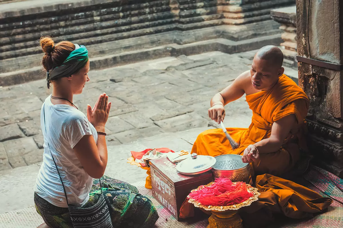 Blessed by Buddhist Monk in Angkor Wat.