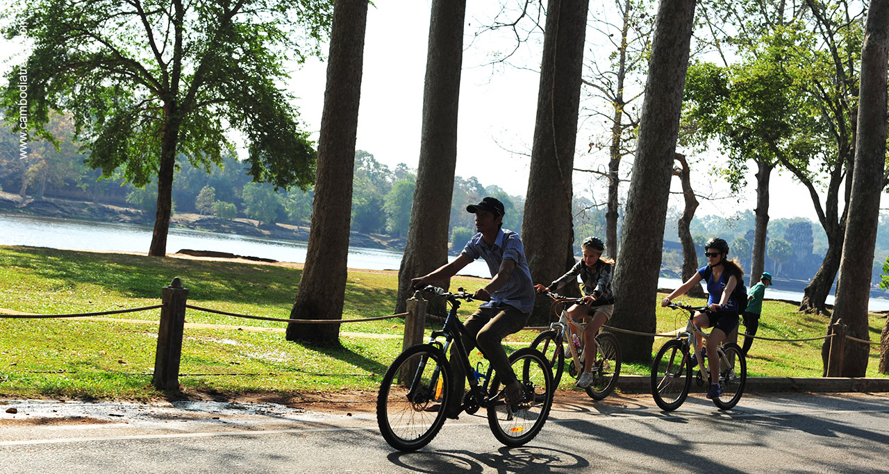 Explore Angkor Complex by bicycle is one of best things to Do in Siem Reap